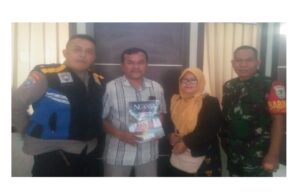 PAC LDII Desa Linggar Serahkan Kalender Meja 2025 kepada Aparat Desa Linggar